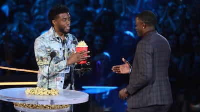 Chadwick Boseman gives his Best Hero award for his role in 'Black Panther' to James Shaw Jr, who is credited with saving lives during a shooting at a Waffle House in Antioch, Tennessee, at the MTV Movie and TV Awards in Santa Monica, California. AP