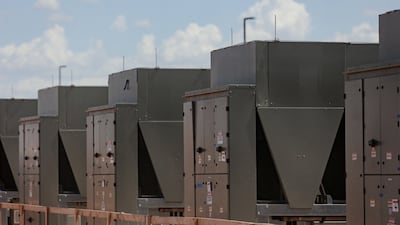 Chillers that cool water are connected to the OpenAI data centre in Abilene, Texas. The surge in data centres is a key driver of the AI boom. Reuters
