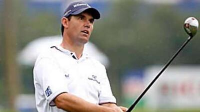Padraig Harrington is five shots off the leader Lam Chih Bing after the first round of the Singapore Open.