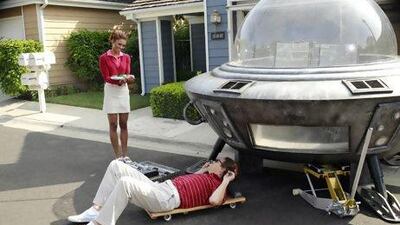 Toks Olagundoye, left, and Simon Templeman in a scene from The Neighbors. Ron Tom / ABC