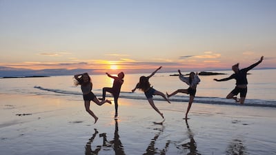 'Hopeman Happiness', taken at Moray, Scotland by Jacky Pratt, is the People and Recreation category winner. PA