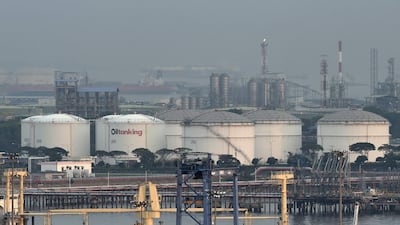 Oil storage tanks on Jurong island off Singapore. The city-state's biggest oil trader is seeking a moratorium on $3.85bn worth of debt. AFP