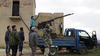 Fighters from Ahrar Al Sham are seen here in Jabal Al Zawiya in the southern countryside of Idlib on January 22, 2017. Khalil Ashawi / Reuters