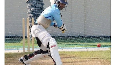 Kumar Sangakkara tries to keep his focus on his cricket at the Sharjah Stadium.