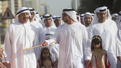 Sheikh Mansour bin Zayed, Deputy Prime Minister and Minister of Presidential Affairs speaks with Sheikh Abdullah bin Zayed, during the national parade from Al Manhal Palace to Qasr Al Hosn fort. Christopher Pike / Crown Prince Court - Abu Dhabi