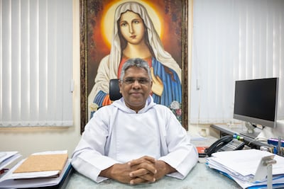 Father Savarimuthu Antonysamy, Parish priest attends Easter Sunday mass at St Michael’s Catholic Church in Sharjah. Ali Al Shouk / The National