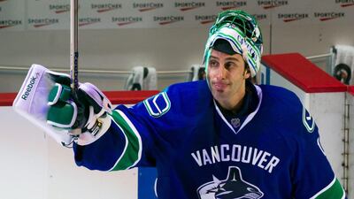 Goalie Roberto Luongo is leaving Vancouver, where he was play-off fixture with the Canucks, and returning to the Florida Panthers, where he played from 2000 to 2006. Darryl Dyck / AP Photo