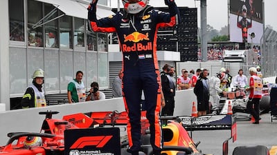Verstappen celebrates his success in parc ferme. AFP