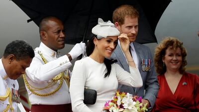 Britain's Prince Harry and Meghan, Duchess of Sussex on their arrival in Suva, Fiji. AP Photo