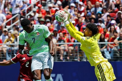 Qatar goalkeeper Mahmoud Abunada was kept busy throughout against Switzerland. Reuters