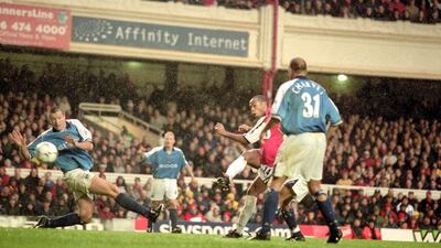 Thierry Henry scores for Arsenal against Manchester City in 2000. Reuters