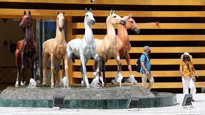 Visitors outside the Turkmenistan pavilion at the EXPO 2020 site in Dubai on 3 October, 2021. Pawan Singh/The National.