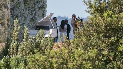 Kim Kardashian, in a gown with a sheer back designed by Givenchy's Riccardo Tisci, and Kanye West had their wedding at the 16th century Fort Belvedere in Florence, Italy. radaronline.com / Splash News