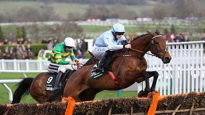 Honeysuckle, ridden by Rachael Blackmore, on the way to winning the Champion Hurdle Challenge Trophy. PA