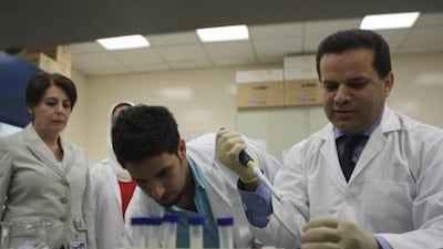 Dr Bassam Ali, above right, with Dr Lihadh Al Gazali, far left, says there are advantages to pre-implantation genetic diagnosis.