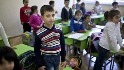 A Syrian Armenian boy at a school in Yerevan. The Armenian Education Ministry has allowed Syrian Armenian students to follow a Syrian curriculum at a state school in Yerevan.