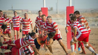Members of the RAK Rugby team - formerly known as the RAK Goats - play on their sand pitch in September 2016. Courtesy Roger Harrison