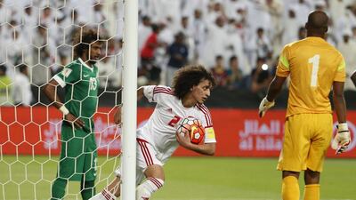 UAE’s Omar Abdulrahman celebrates after scoring against Saudi Arabia during their World Cup 2018 Asian qualifying football match on March 29, 2016 at the Mohammed Bin Zayed Stadium in Abu Dhabi. / AFP / KARIM SAHIB
