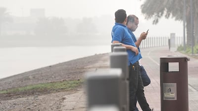 Two men enjoy the weather.