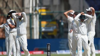 Australia's players react after an unsuccessful appeal against Pakistan's Babar Azam. AFP