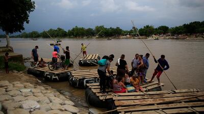 Mexican officials said Tuesday they were beginning deployment of the country's National Guard for immigration enforcement, but on Wednesday morning, commuters, merchandise and occasional groups of migrants continued to flow freely across Mexico's porous southern border. AP