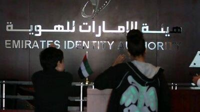 People getting their tokens for ID card at Emirates Identity Authority registration centre in Al Barsha in Dubai.