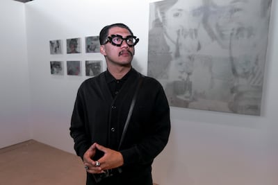 Martin Ong Yambao incorporates found photographs and the Filipino healing ritual of pagtatawas into works exploring memory, loss and preservation. Victor Besa / The National