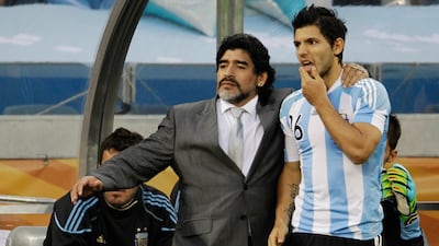 Argentina manager Diego Maradona with Sergio Aguero during the 2010 World Cup quarter-final match against Germany at the Green Point Stadium in Cape Town. AP
