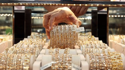 Gold pieces at Kanz Jewels. Younger generations favour lightweight jewellery over heavier, traditional pieces. Chris Whiteoak / The National