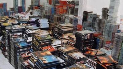 Thousands of confiscated DVD's seized by Dubai police. Nearly 5,000 illegal traders were arrested last year.