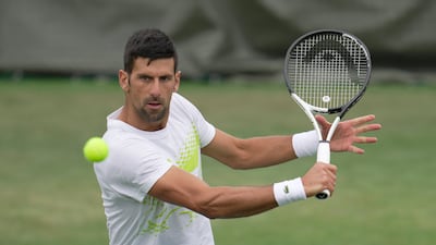 Novak Djokovic on the practice court as the defending champion aims to win his eighth Wimbledon title. AP