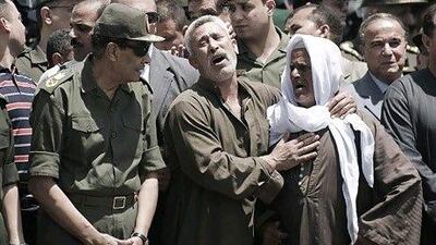 Egypt's military ruler, Field Marshal Hussein Tantawi, attends the funeral of a member of Egypt's special forces in Cairo on Saturday. The soldier was killed in clashes between troops and anti-military protesters on Friday.