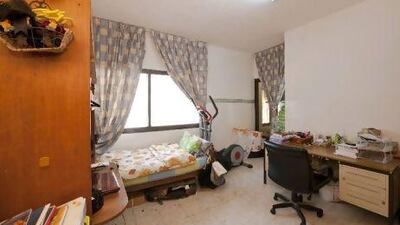 Before the makeover, old furniture and plain white walls created a cold atmosphere that didn't reflect Iman's personality. Courtesy Home Centre