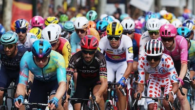 Richard Carapaz, wearing the polka dot jersey, during the 21st and final stage. Reuters