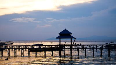 The view from Mabul island, the resort island located 20 minutes ride by speedboat from Sipadan Island off the coast of Borneo, Malaysia. Photo: Antonie Robertson/The National