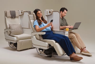 Passengers can raise or lower a divider between seats and lock it in position. Photo: Emirates airline