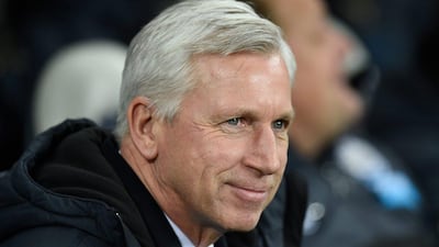 Newcastle United manager Alan Pardew observes his side during their 3-2 Premier League win over Everton on Sunday. The club announced on Monday he had permission to begin talks with Crystal Palace about taking their open managerial position. Stu Forster / Getty Images / December 28, 2014