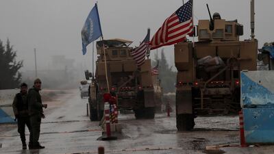 US military vehicles head to their base on the outskirts of Manbij, Syria on December 30, 2018. AFP