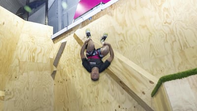 Venue manager Petar Popovic flips off a parkour wall at Bounce X. Antonie Robertson / The National