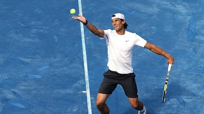 Rafael Nadal is unhappy about playing on blue clay.