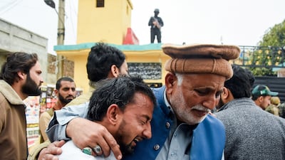 Distraught relatives at the scene. Reuters