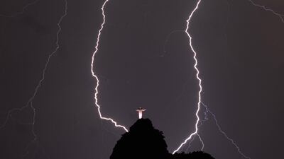Lightning strikes near the Christ the Redeemer monument in Rio de Janeiro. EPA