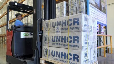UNHCR's emergency stockpile facility in Dubai stores a variety of relief items including blankets, sleeping mats and solar lamps. Pawan Singh / The National