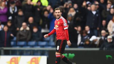 Juan Mata of Manchester United reacts after being sent off by referee Mike Dean during their Premier League loss to West Brom on Sunday. Laurence Griffiths / Getty Images / March 6, 2016