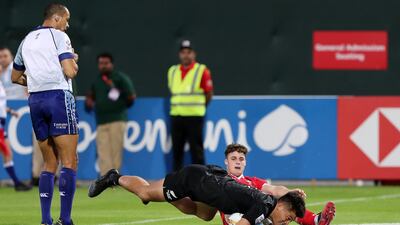 Tone Ng Shiu of New Zealand scores against Wales at The Sevens Stadium in Dubai. Chris Whiteoak / The National