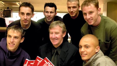 Eric Harrison, centre, with Manchester United players (from left) Gary Neville, Phil Neville, Ryan Giggs, David Beckham, Nicky Butt and Wes Brown back in 2001.