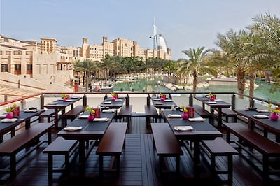 Madinat Jumeirah, with its view of the Burj Al Arab, features hotels and dozens of restaurants at its sprawling beachfront location. Photo: Jumeirah Group