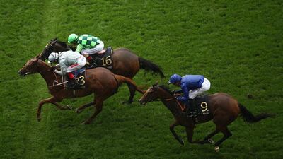 Frankie Dettori, riding Raffle Prize, crosses the finish line to win The Queen Mary Stakes. Getty Images