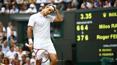 Roger Federer's last competitive match was the Wimbledon semi-final defeat to Milos Raonic in July. Leon Neal / AFP