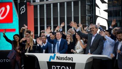 John Foley, co-founder and chief executive officer of Peloton Interactive, rings the opening bell at the Nasdaq MarketSite in New York on Wednesday after its shares began trading on the exchange. Its value fell 15 per cent by the end of the week. Bloomberg